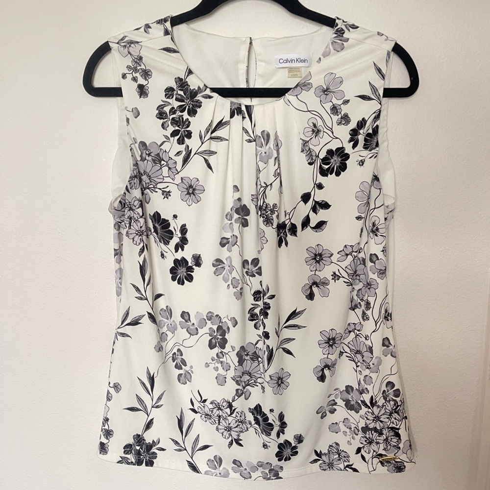 Woman’s floral Calvin Klein blouse